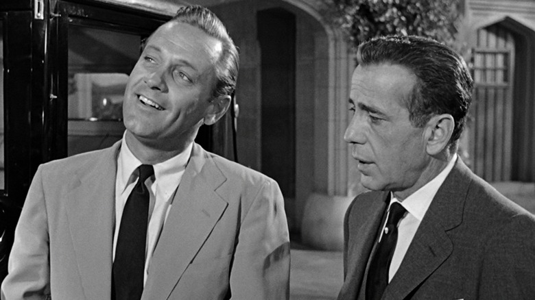 William Holden's David Larrabee smiles while Humphrey Bogart's Linus Larrabee looks on in Sabrina