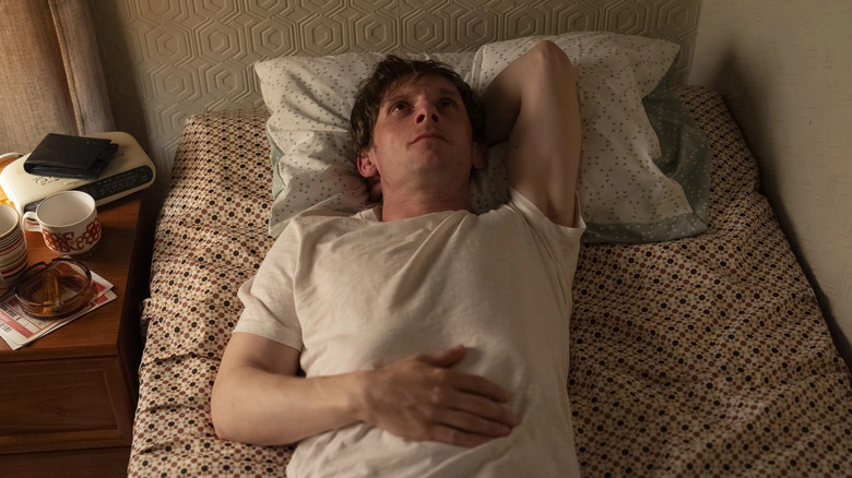 Jamie Bell as Niall laying in bed in Half Man