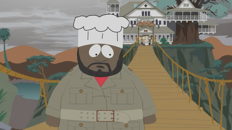 Chef on a bridge, thinking about returning to the cult behind him on South Park