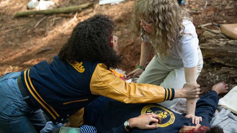 Taissa and Misty with the assistant coach after the plane crash