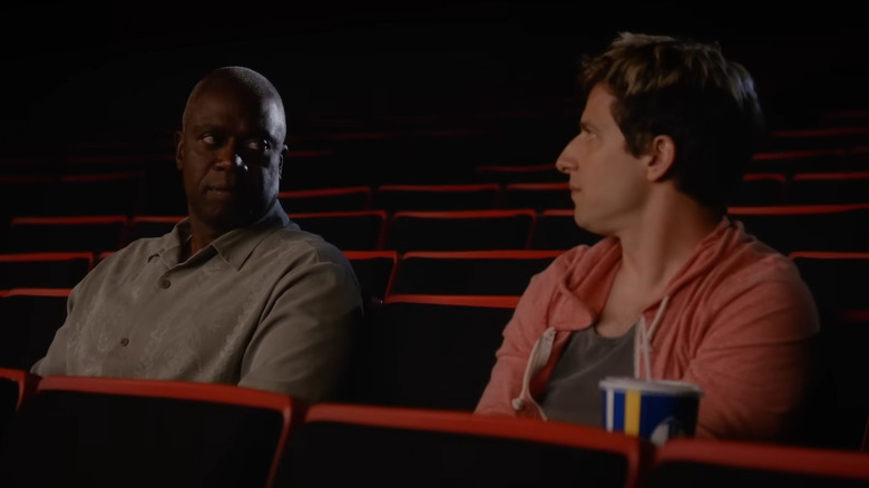 Captain Holt and Jake Peralta in the movie theater