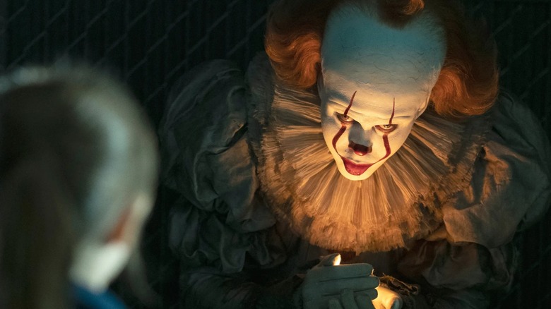 Pennywise talks to a child during his final hunting cycle in It: Chapter Two