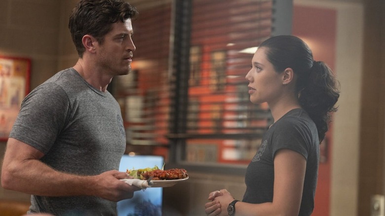 Jake Lockett as Sam Carver shares a tense moment with Hanako Greensmith as Violet Mikami in Chicago Fire