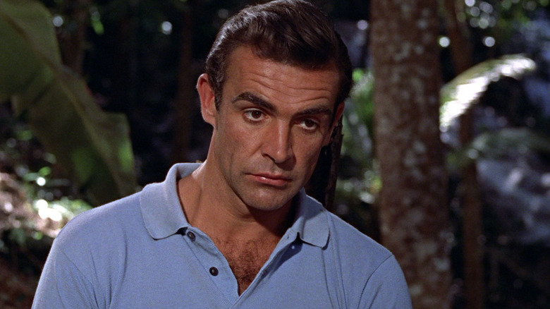 James Bond wearing a blue shirt in Dr. No