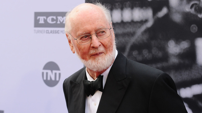 John Williams in black suit