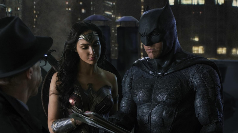 Wonder Woman and Batman reading a folder in the League of Justice