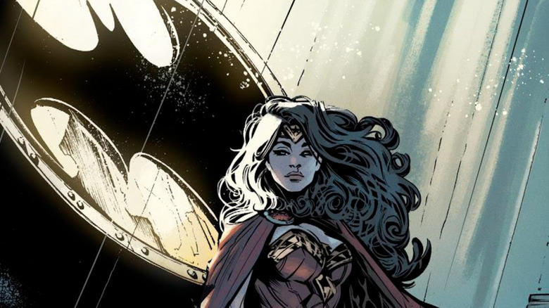 Wonder Woman stands in front of a bat signal as Commissioner Gordon looks forward to Batman #39