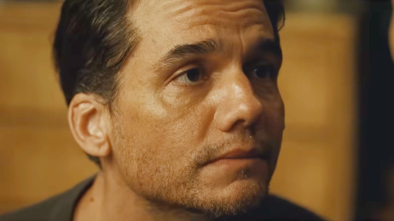 Wagner Moura as Jason looking worried in The Last House