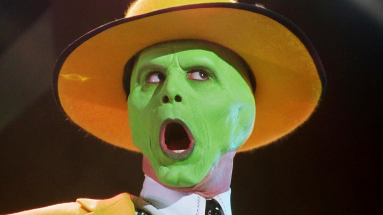 Jim Carrey's The Mask opens his mouth wide in closeup in The Mask
