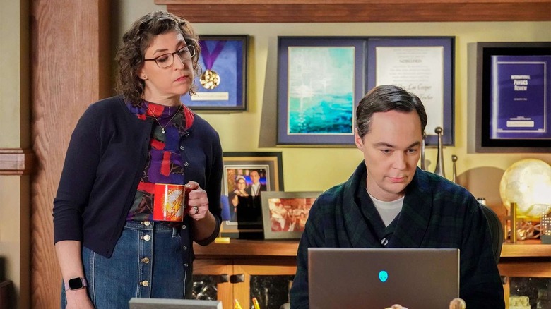 Mayim Bialik as Amy and Jim Parsons as older Sheldon in his office in Young Sheldon