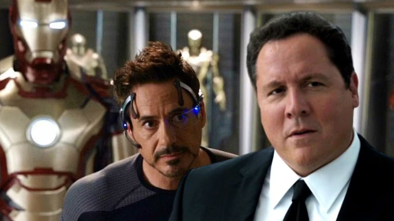 Tony Stark looking over Happy Hogan's shoulder in an Iron Man movie