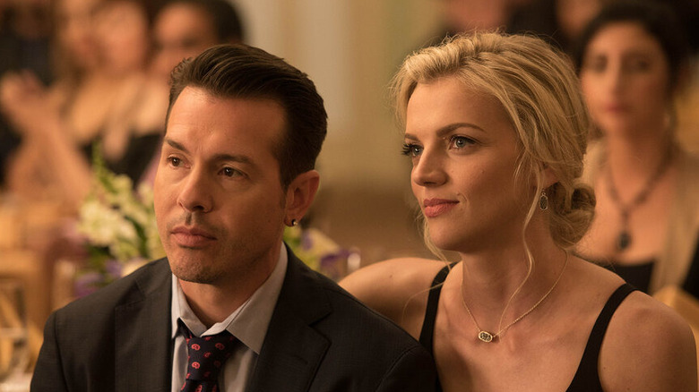 Jon Seda's Antonio Dawson sits next to Kara Kilmer's Sylvie Brett in Chicago PD.jpg
