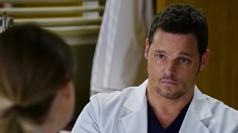Alex (Justin Chambers) talking to Meredith (Ellen Pompeo) on Grey's Anatomy