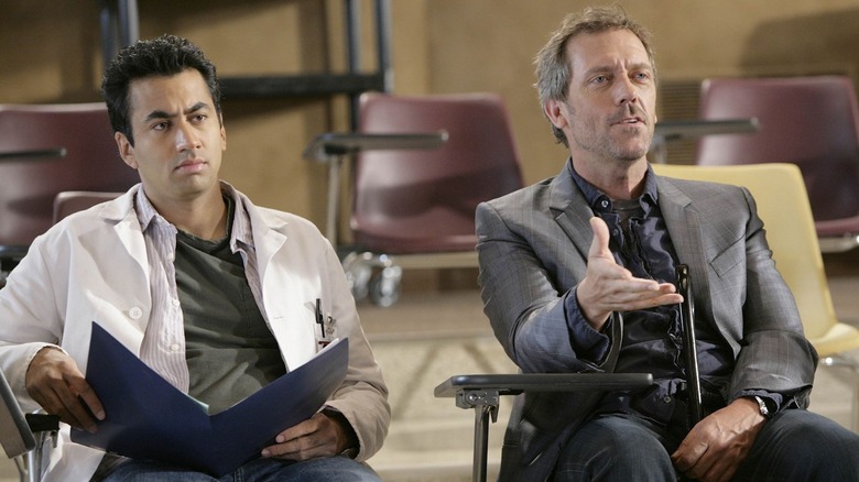 Hugh Laurie's Gregory House and Kal Penn's Laurence Kutner sitting in a lecture hall in House MD