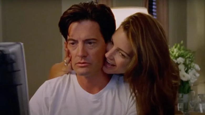 Charlotte caressing Trey's head on Sex and the City