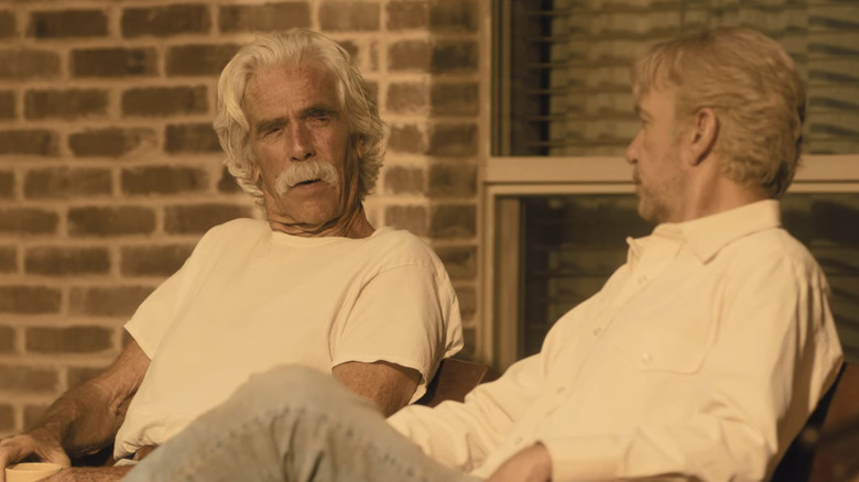 Billy Bob Thornton's Tommy Norris sits beside Sam Elliott's T.L. Norris as they converse in Landman