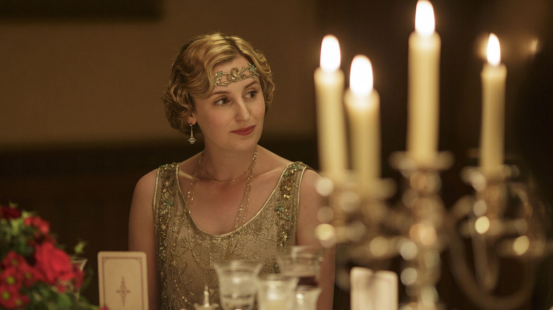Lady Edith sitting down for Dinner in Downton Abbey