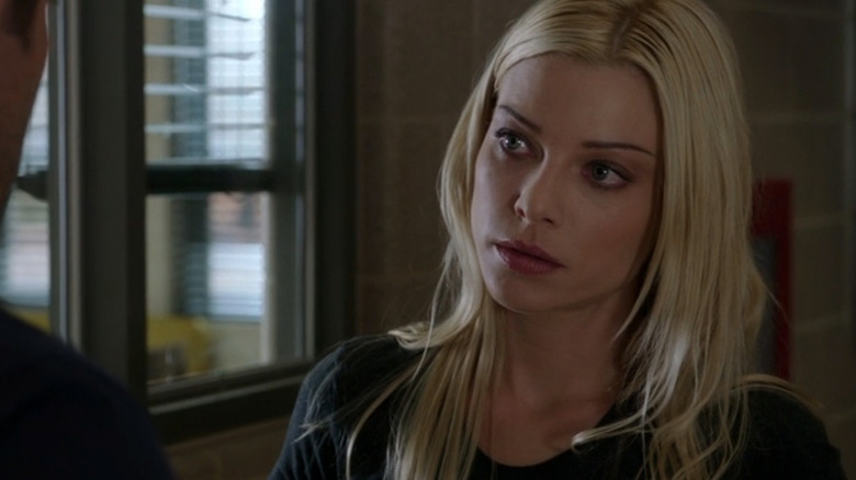 Lauren German's Leslie Shay looks at someone offscreen in Chicago Fire