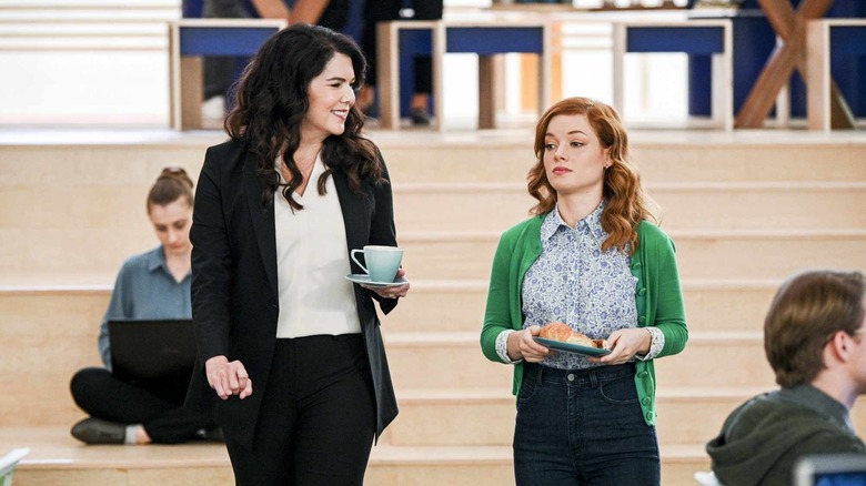 Joan and Zoey talking in the office on Zoey's Extraordinary Playlist
