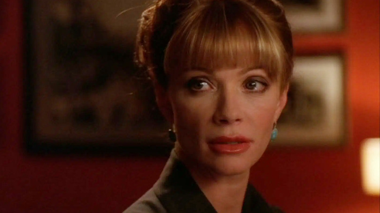 Lauren Holly's Jenny Shepard looking thoughtful on NCIS