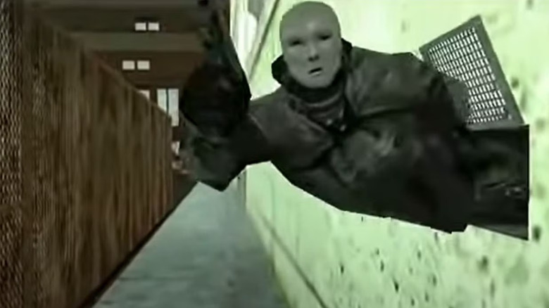 The Assassin oozing through a grate with a gun in The Matrix Online