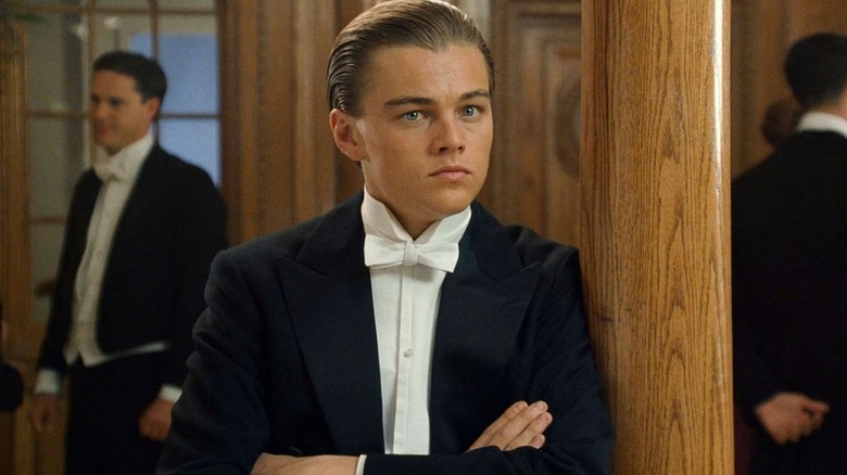Jack in a tuxedo looking alarmed in Titanic