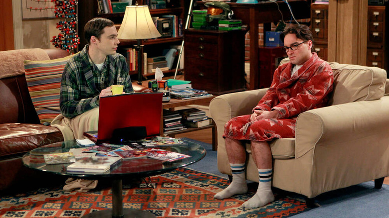 Sheldon and Leonard in their pajamas and robes in the living room on The Big Bang Theory