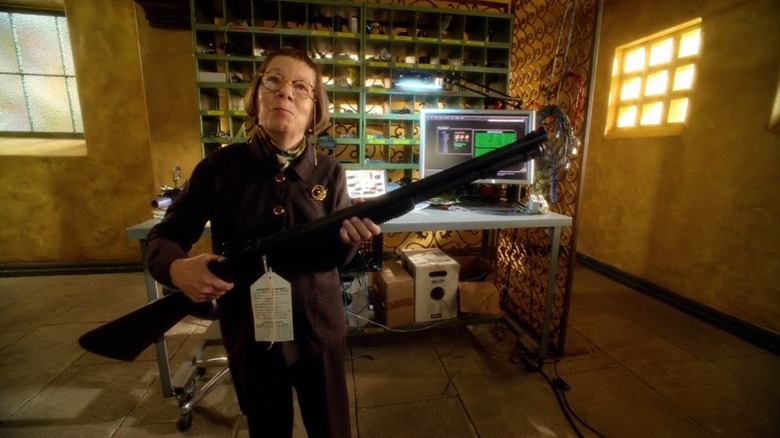 Linda Hunt's Hetty holding a shotgun in NCIS: Los Angeles