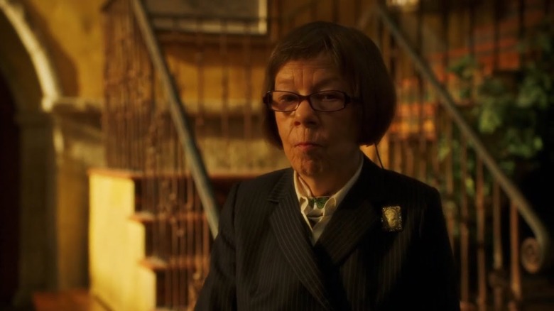 Linda Hunt's Hetty standing by the stairs in NCIS: Los Angeles season 6