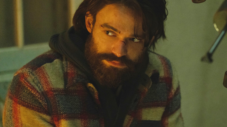 Thomas Doherty as Link sits down to speak to Annie in Paradise season 2