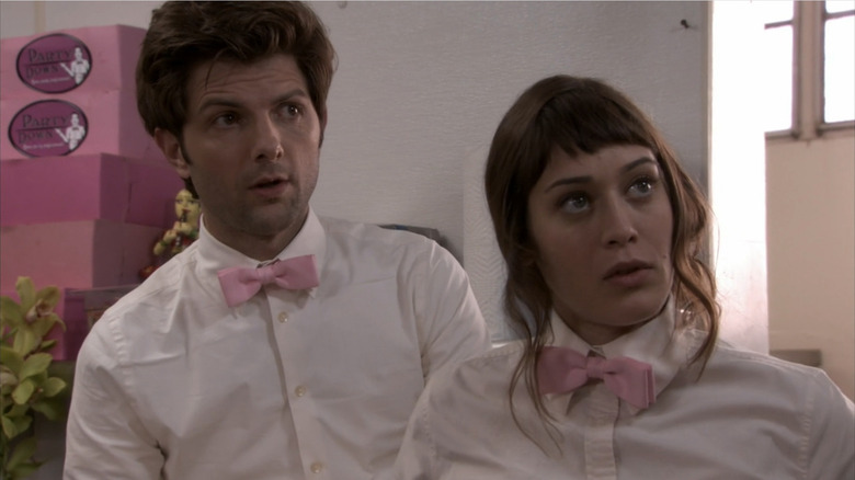 Adam Scott and Lizzy Caplan as Henry and Casey in Party Down