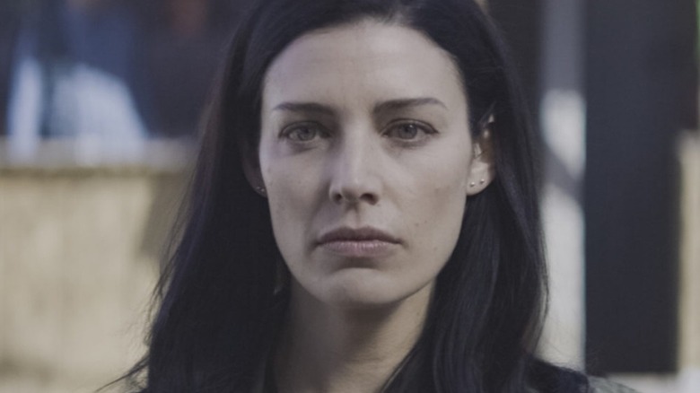 Jessica Paré looks pensive as Amanda 