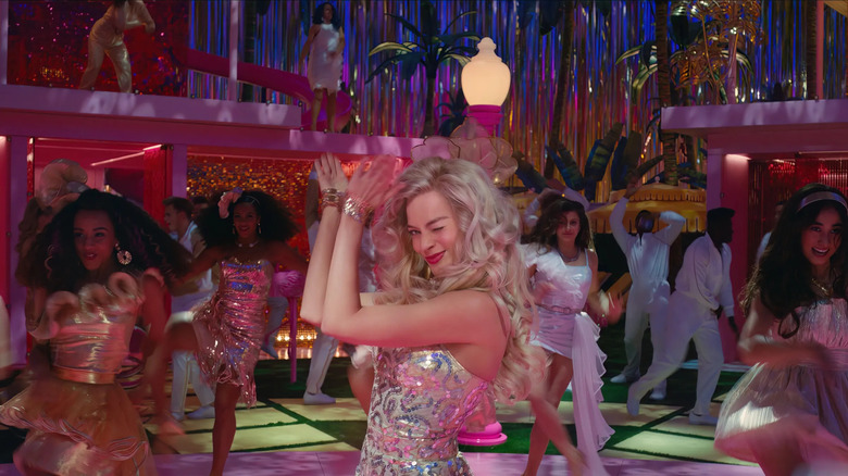 All of the Barbies dancing in the Dreamhouse in Barbie