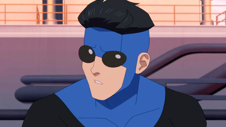 Mark Grayson looks concerned about her blue suit in the invincible