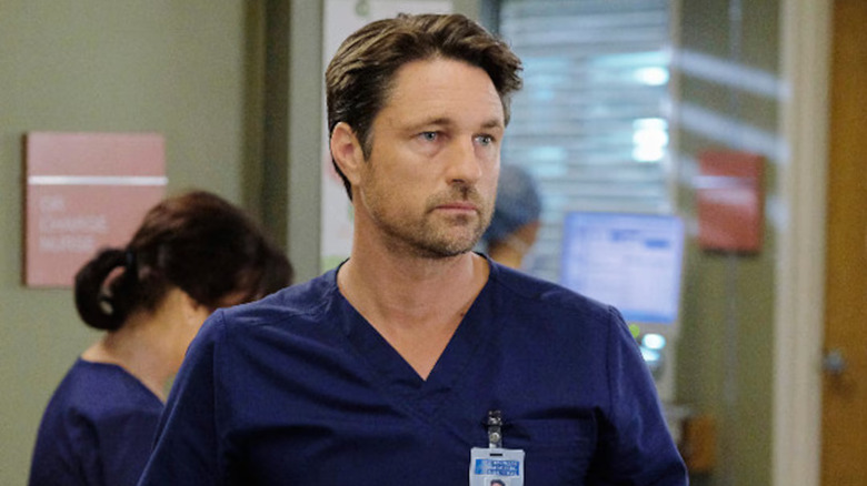 Nathan in blue scrubs in the hospital on Grey's Anatomy