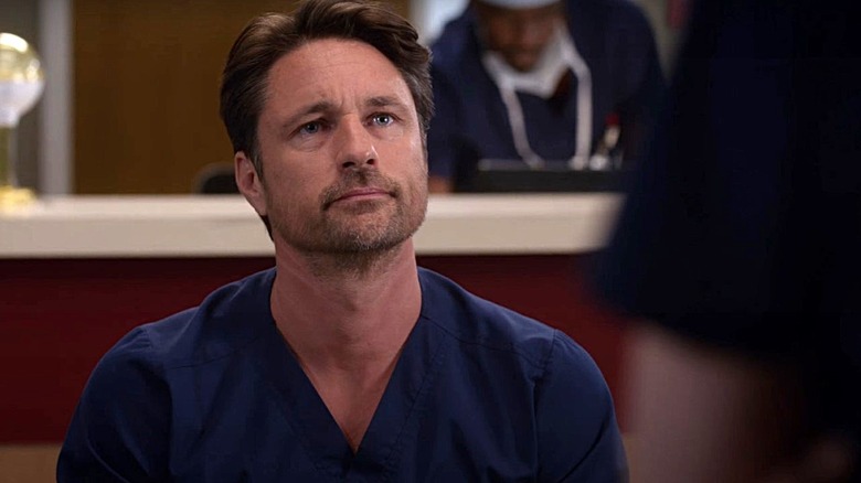 Nathan looking up at someone on Grey's Anatomy