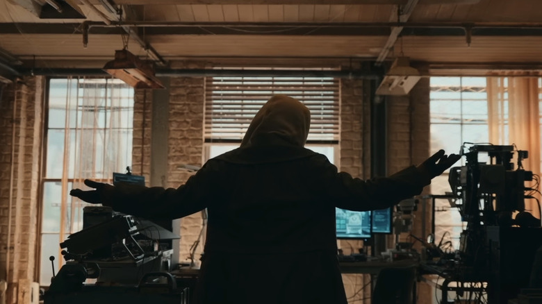 Sadie Sink's Jean Grey stands in Peter Parker's apartment with her arms raised in Spider-Man Brand New Day