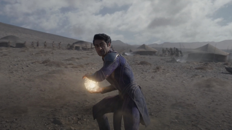 Kingo prepares to fire ball of energy from his hands