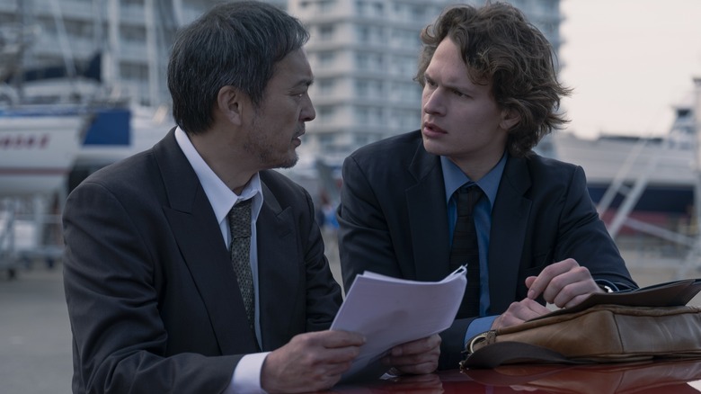 Jake and Katagiri looking distressed while investigating in Tokyo Vice