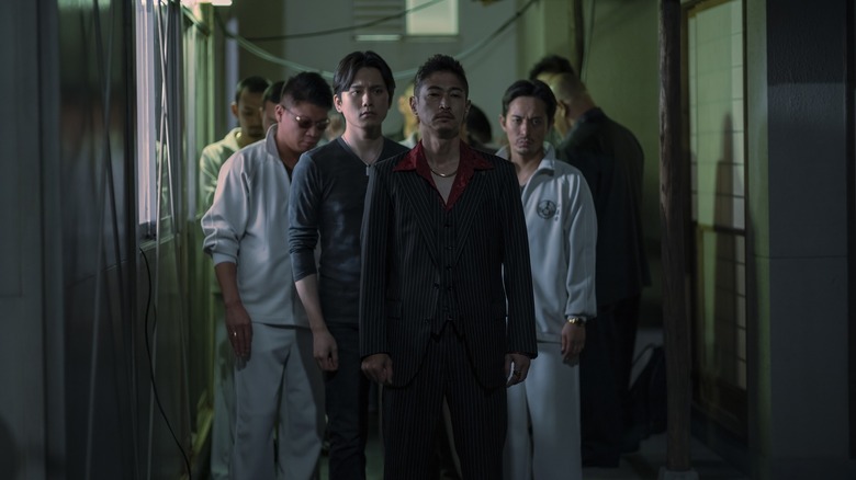 Naoki Hayama surrounded by his army of yakuza in Tokyo Vice