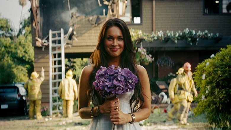 Mikaela holding some flowers in Transformers: Revenge of the Fallen