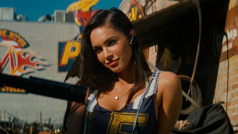 Mikaela talking on her headset while sitting on a motorcycle in Transformers 2: Revenge of the Fallen