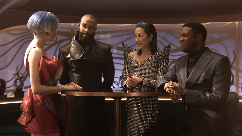 Rachel Garrett, Alok, Empress Georgiou, and Quasi around a table in Star Trek: Section 31