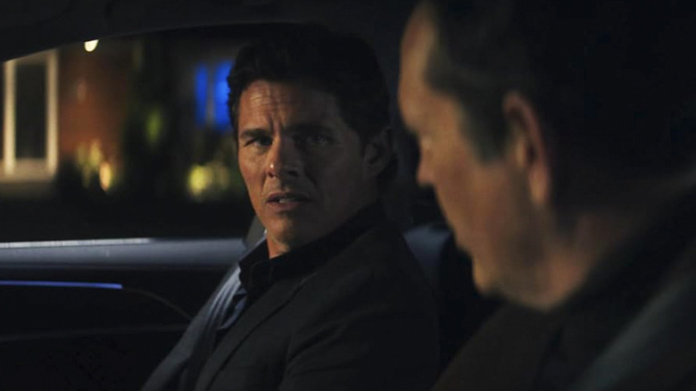 Mike looks at Nick in the front seat of a car in Mike & Nick & Nick & Alice