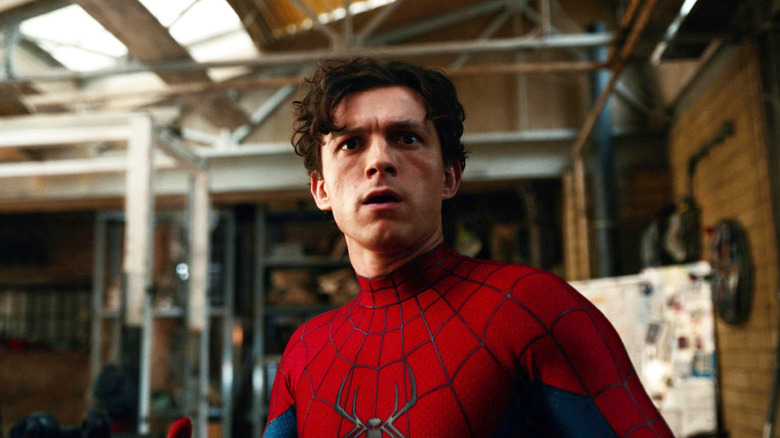 Tom Holland as Spider-Man with a surprised look on his face in Spider-Man: Brand New Day