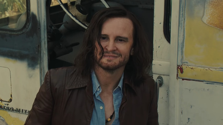 Damon Herriman as Charlie by his van in Once Upon a Time in Hollywood