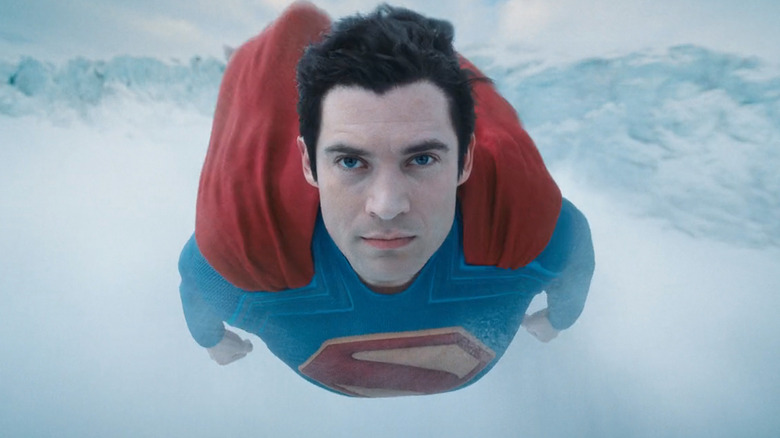 David Corenswet's Superman flies across a frozen landscape in Superman