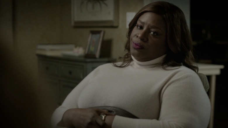 Retta's Ruby sits with arms crossed in Good Girls