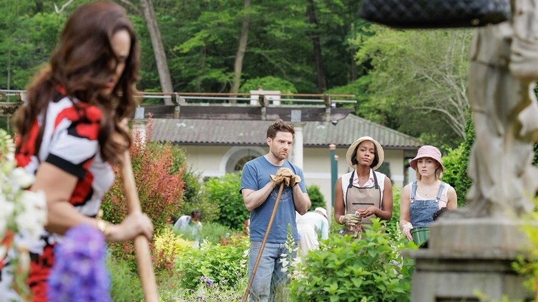 Ben RappaPort's Brett, Annasophia Robb's ALICE and Aja Naomi King's Catterine Watch Watch Melissa Fumero's Birdie while she is digging in a garden in Grosse Pointe Garden Society