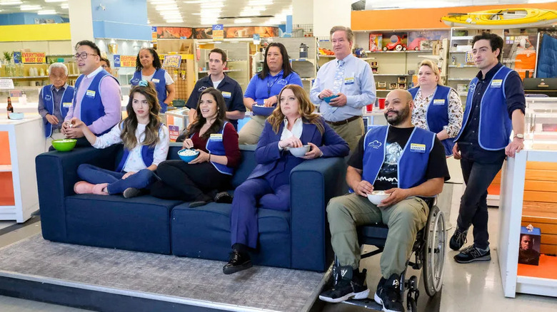 Mateo Marcus Cheyenne Amy Dina Garrett Sandra Glenn Justine and Jonah watching TV in Superstore